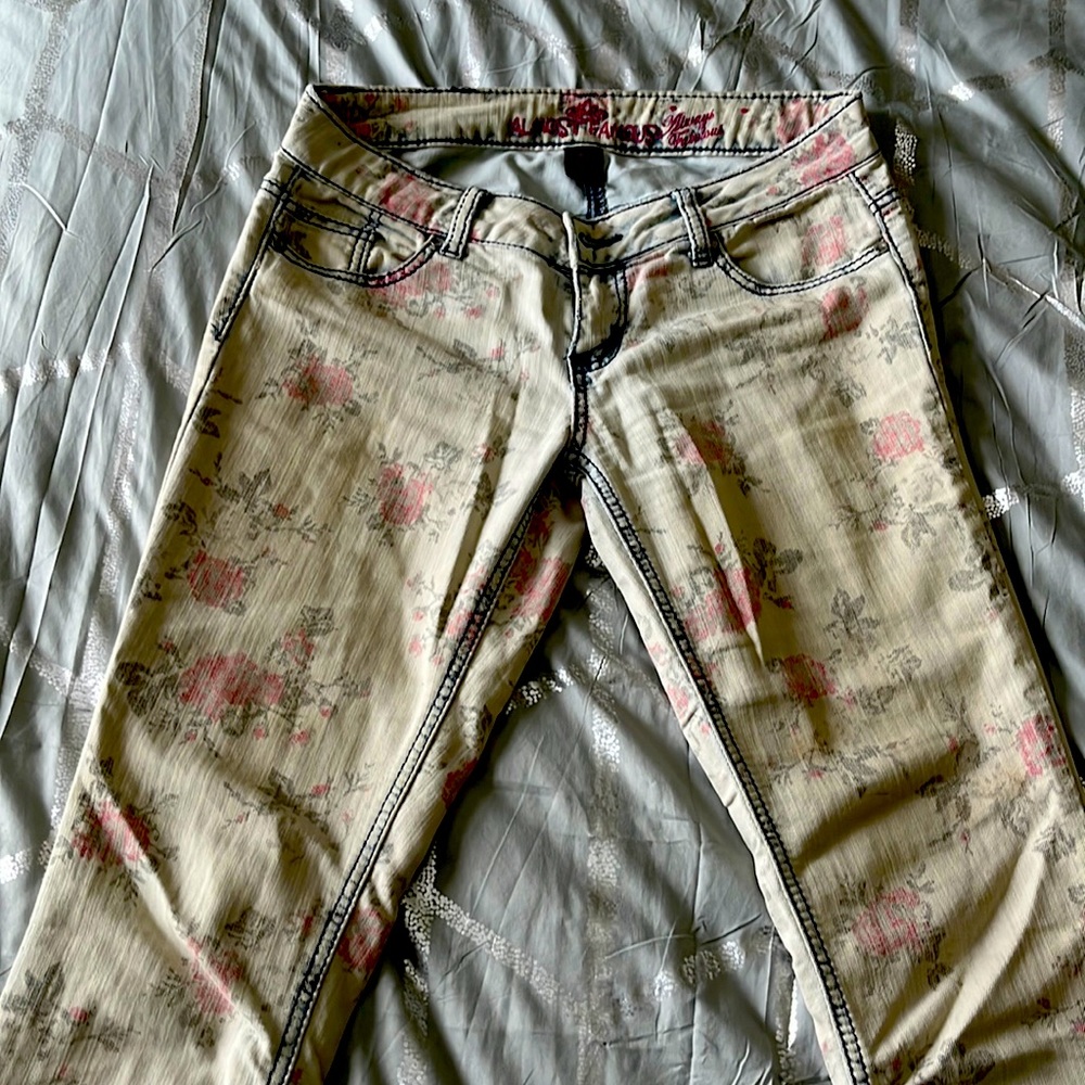 Low rise white skinny jeans with roses